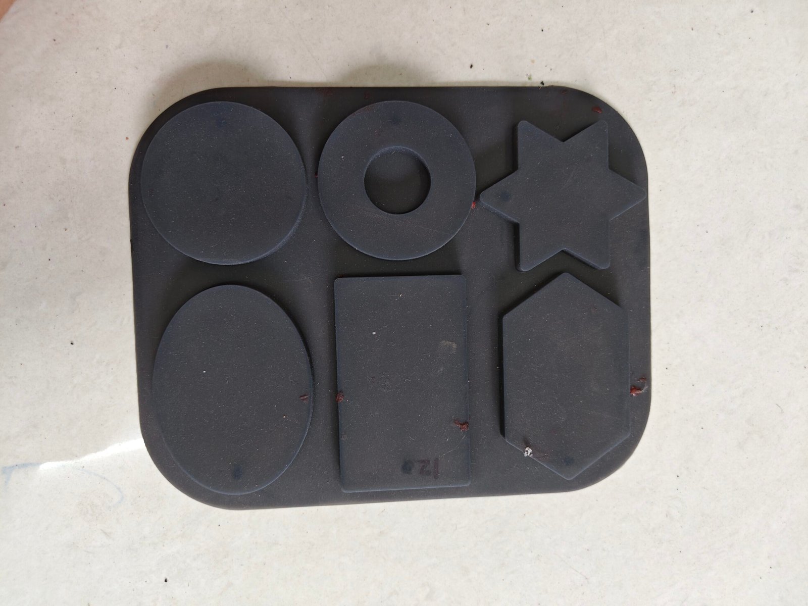 6-cavity rectangle, star, circle, ring, oval, and hexagon candle silicon mold